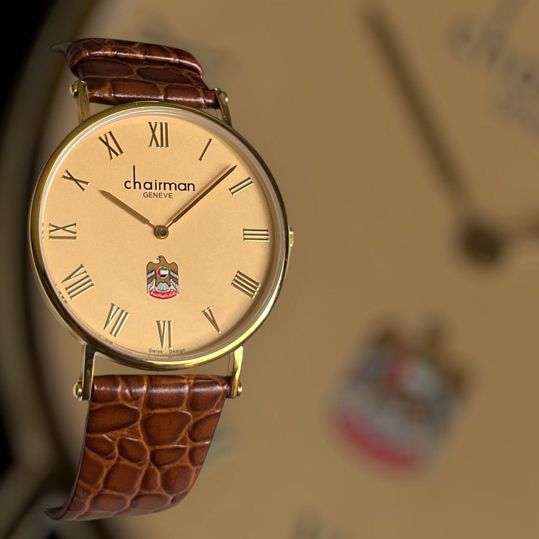 Chairman Geneve Roman Numeral Beige Dial UAE Emblem Vintage Brown Strap Gents Watch