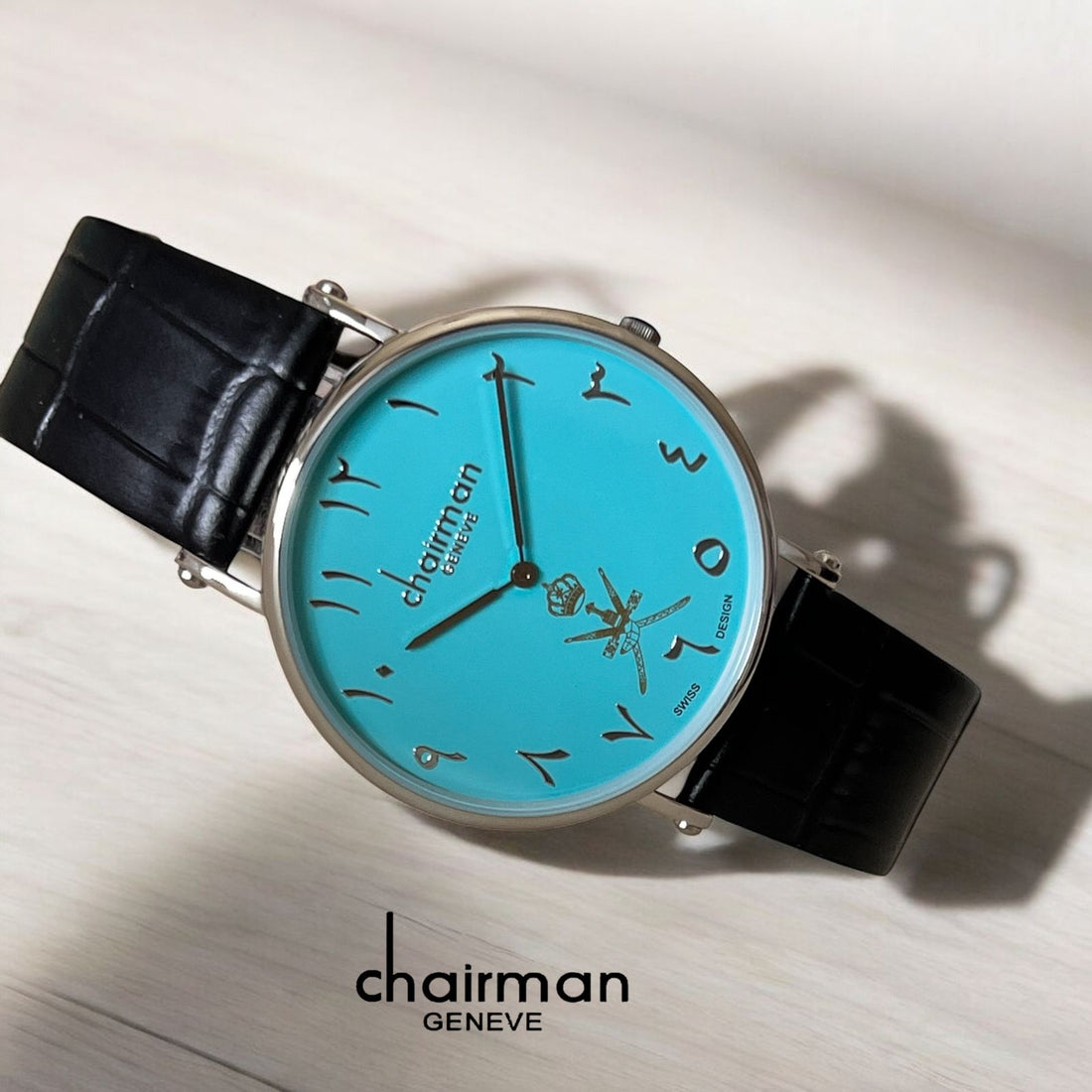 Swiss Design Chairman Geneve OMAN Emblem Arabic Sky Blue Dial Black Strap Gents  Watch